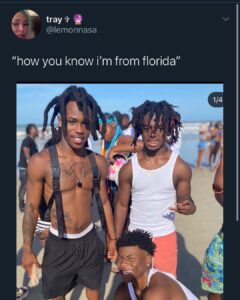 Tweet of three young men at the beach with the caption “how you know i’m from florida”; their hairstyles, outfits, and expressions reference Florida stereotypes.